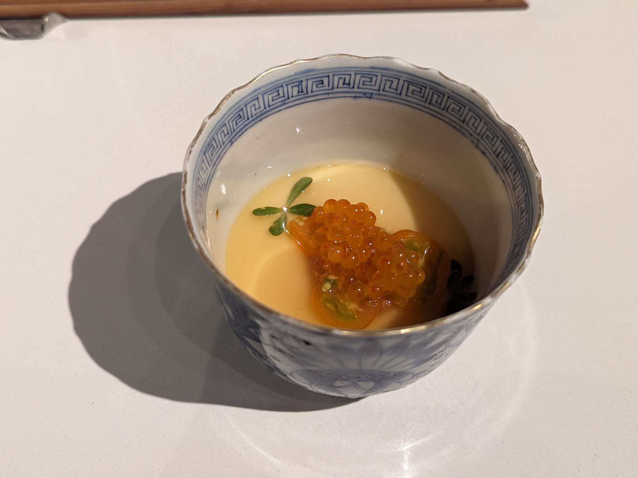 Cold chawanmushi, cherry tomato, seaweed, trout roe at Nisei